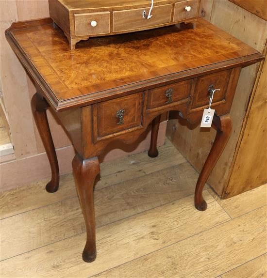 A Georgian style burr walnut lowboy W.88cm